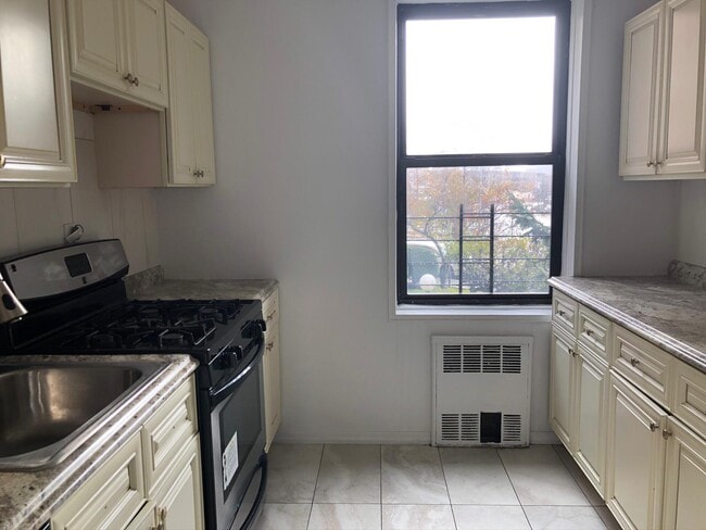 Building Photo - 10025 Queens Blvd