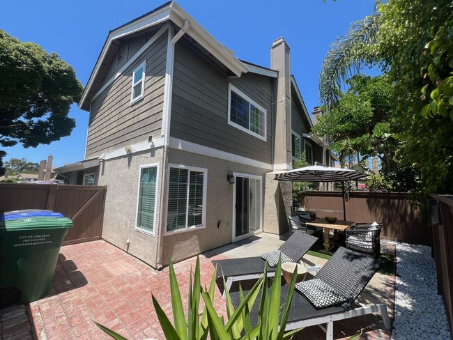 Building Photo - Remodeled townhome located in the Cape at ...