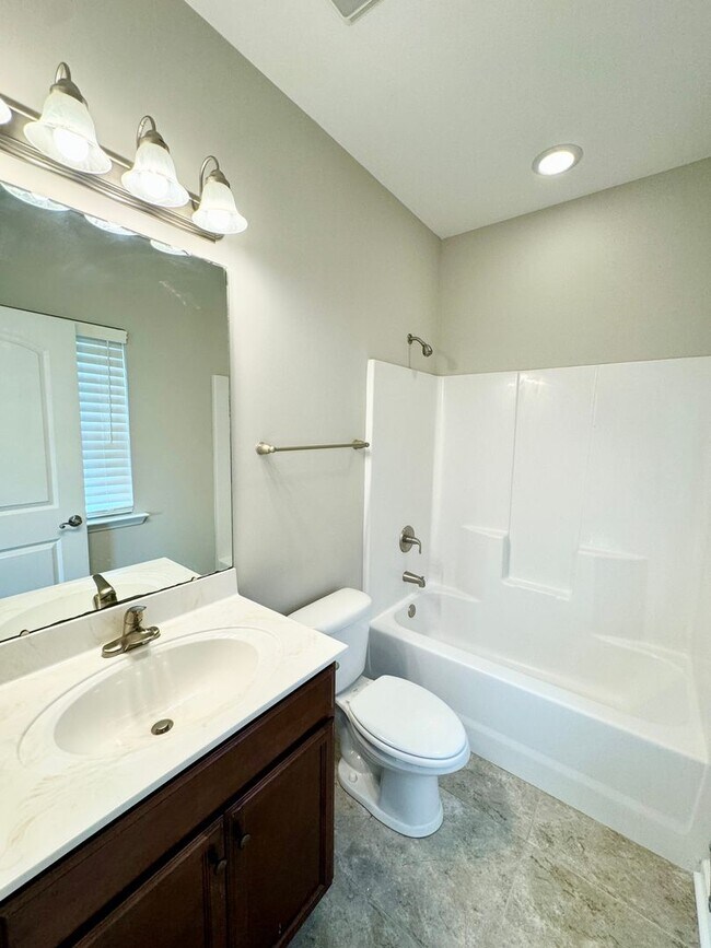 Building Photo - AVAILABLE 3 Bedroom/ 2 Bath with attached garage! Beautiful finishes throughout