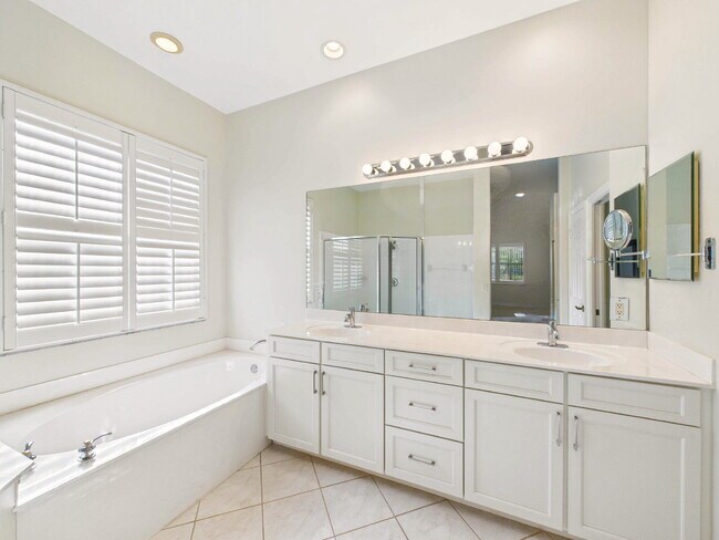 Building Photo - Resort-Style Furnished Home with Private Pool in Masters at Pelican Sound