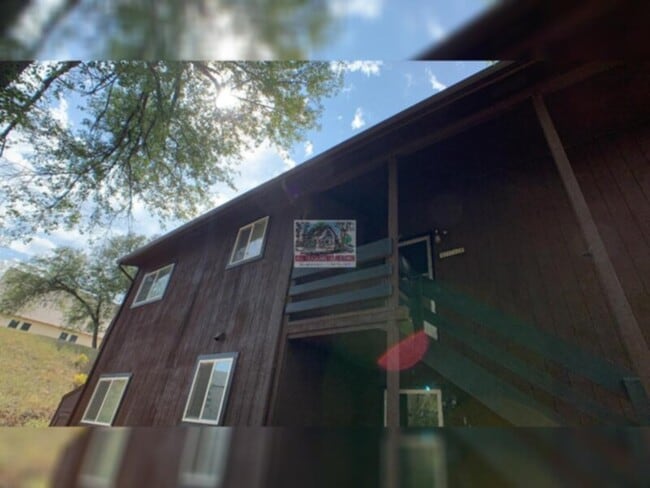 Building Photo - Tired of outdated rentals? This stunning two bedroom upper level duplex unit boasts a complete moder