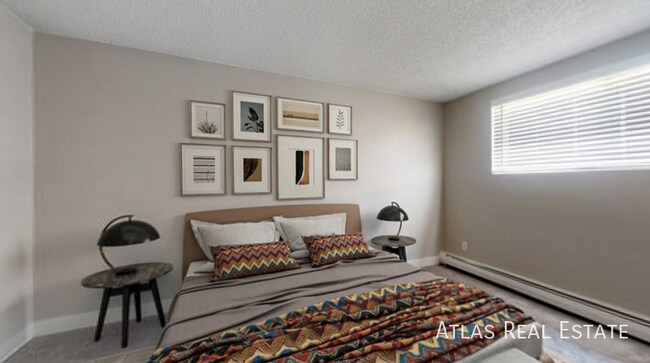 Building Photo - 7155-103 N Raleigh Street-103