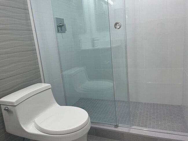 Building Photo - LUXURY 2 BED 2.5 BATH DUPLEX, All New , Laundry in Unit Garage Pool,. NO fee