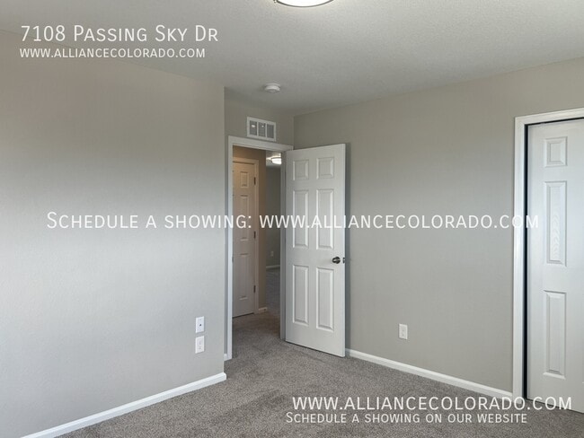 Building Photo - 7108 Passing Sky Dr