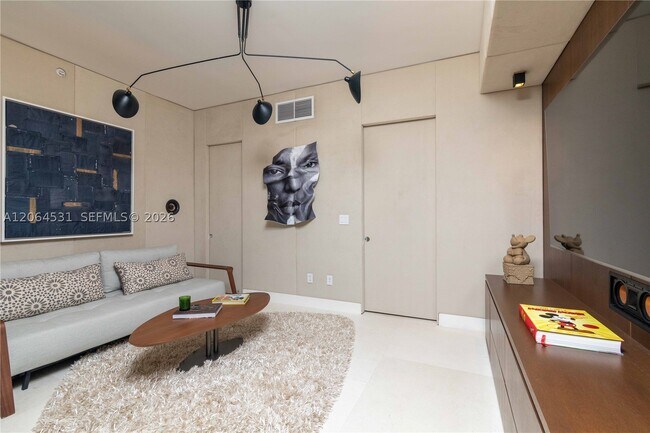 Building Photo - 10201 Collins 1002