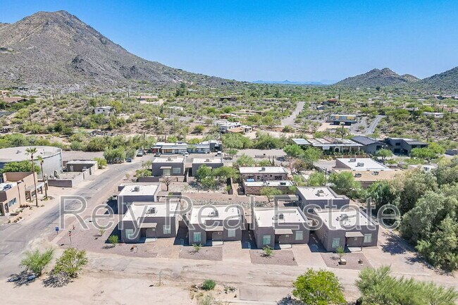 Building Photo - 6050 E Hidden Valley Dr