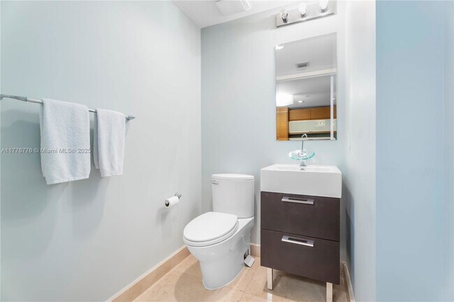 Building Photo - 5875 Collins Ave
