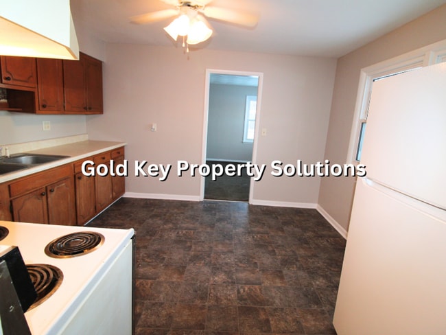 Building Photo - Roomy 4 BR 1 BA House with Back Deck and Shed SECTION 8 APPROVED