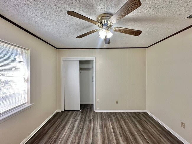 Building Photo - Spacious 4-Bedroom Home on a Corner Lot wi...