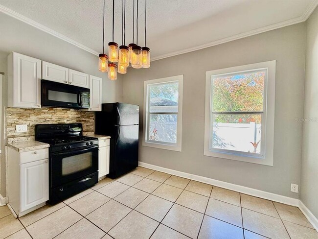 Building Photo - 1216 E 24th Ave