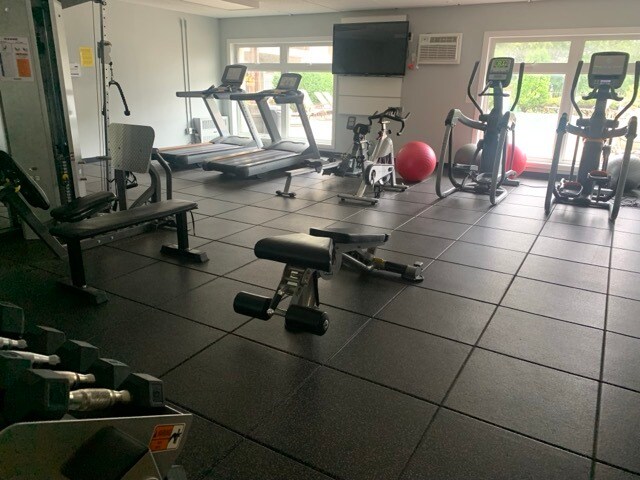 Fitness center with view of pool - 4820 Park Commons Dr