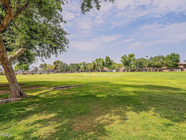 Building Photo - 1266 N 85th Pl