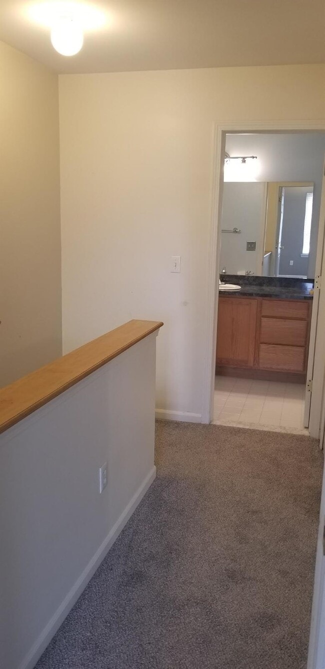 Building Photo - 2 Bedroom, 1.5 Bath Townhouse w/ Garage & Huge Master Bedroom. Full Sized Washer & Dryer In Unit.