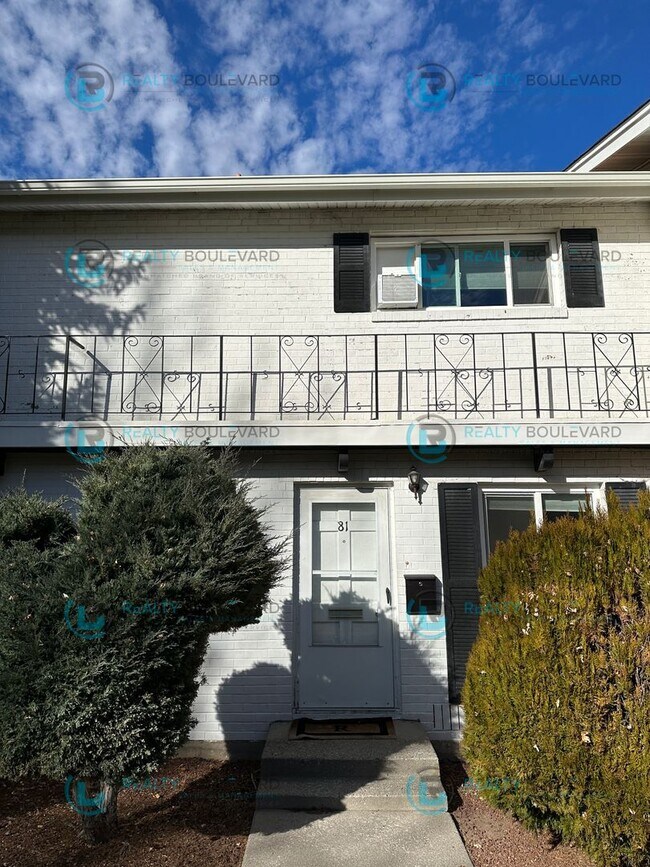 Building Photo - 2-bed, 2-bath, 2-story townhome with pool and park like setting outside the front door.