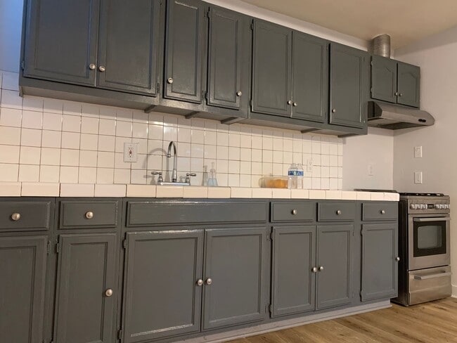 Building Photo - Great Experiences Are Just Around Rolland Curtis!