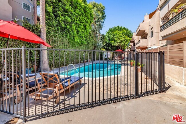 Building Photo - 4477 Woodman Ave