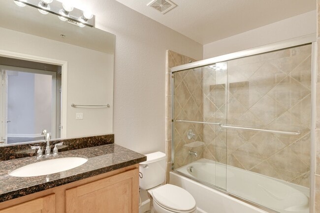 Building Photo - Luxury Guard-Gated 2-Bedroom Condo with Private Garage & Resort Amenities!