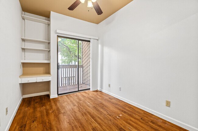 Building Photo - PARK PLACE - ACROSS FROM DKR STADIUM - 1BD / 1BA With Study - WOOD FLOORS - W/D