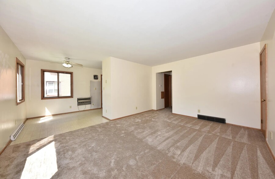 Unit was recently upgraded with high efficiency windows and new white trim with white baseboards. - W166N9108 Grand Ave