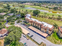 Building Photo - 5350 Woodland Lakes Dr