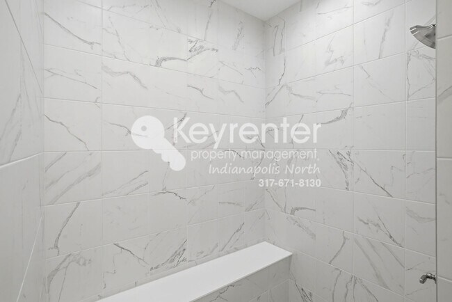 Building Photo - Located in Westfield, IN, this attractive 3-bedroom, 2.5-bath home sits on a corner lot within an...