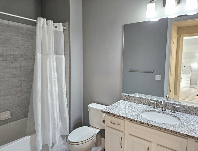 Building Photo - Stunning Model Home – 2 Bedrooms plus Den,...