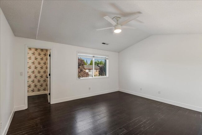 Building Photo - Versatile 4-Bedroom Corner Condo with Main...