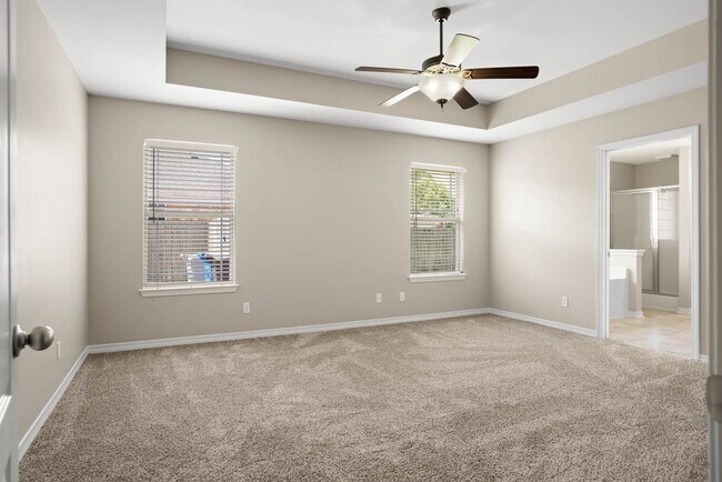 Building Photo - Stunning 4-Bedroom Home with Scenic Lake V...