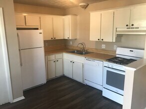 Building Photo - TWO BEDROOM DUPLEX TO SHARE WITH YOUR FURR...