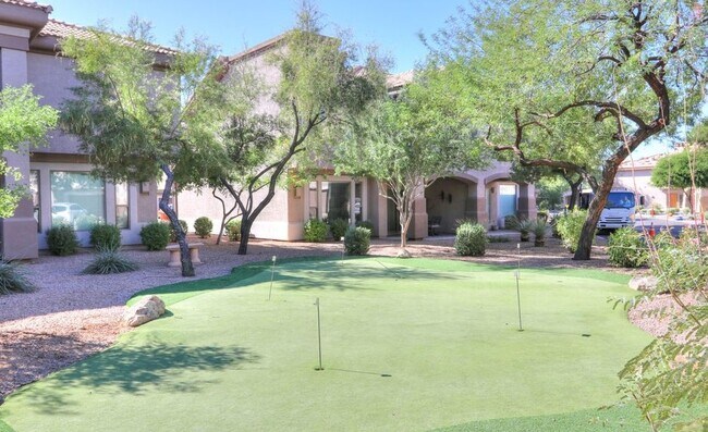 putting green on grounds - 14000 N 94th St