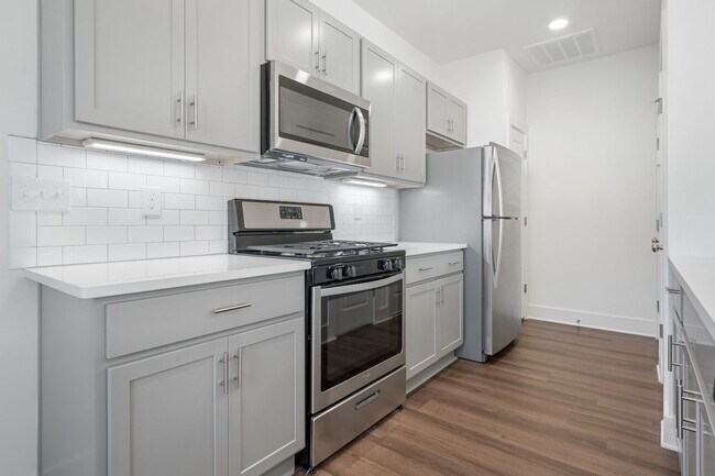 Building Photo - Luxury Living- One Bedroom with Garage and...