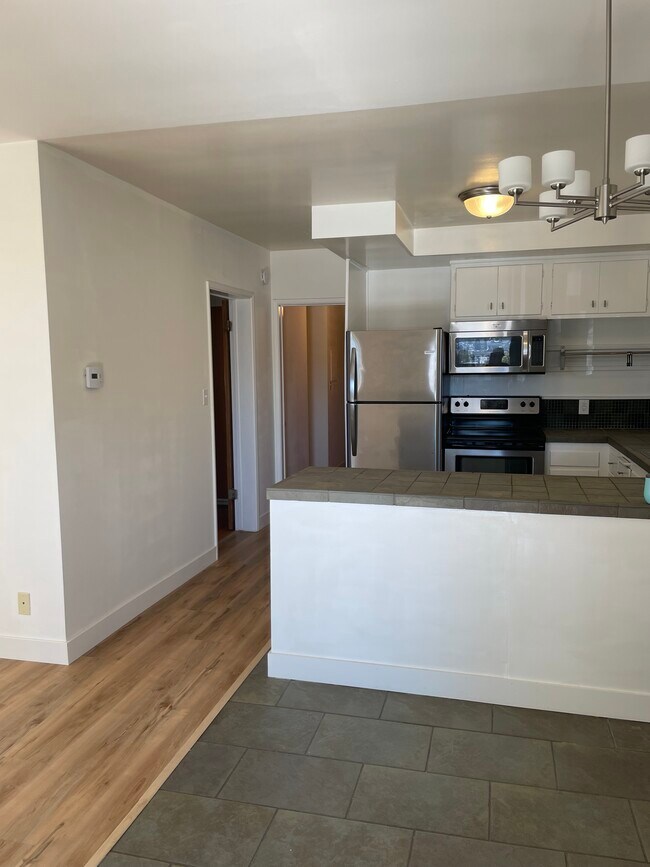 Kitchen from dining area - 563 Avenue A