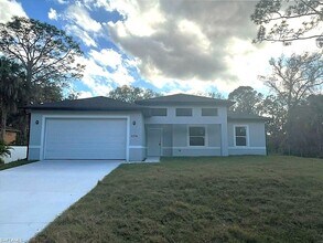 Building Photo - Large 4 bedroom, 3 bath, 2 car garage-MOVE IN READY!