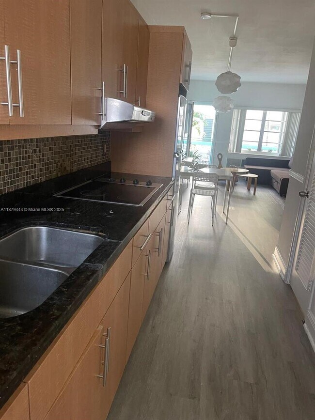 Building Photo - 6498 Collins Ave