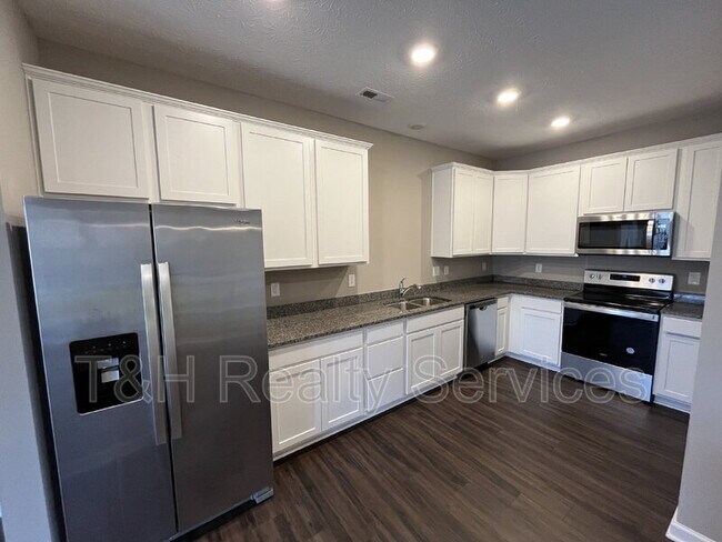 Building Photo - 5642 Brownstone Dr