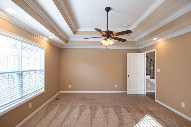 Building Photo - Pet Friendly Three Bedroom with Bonus!