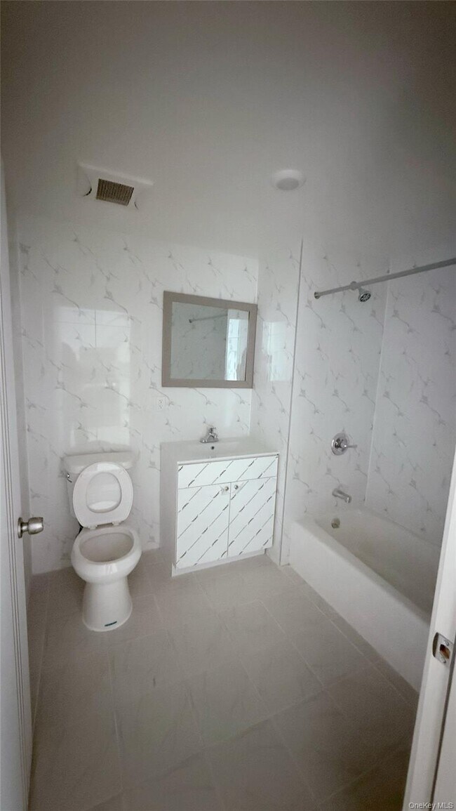 Building Photo - 70-09 45th Ave