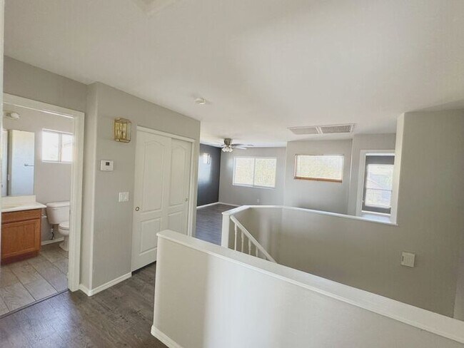 Building Photo - 4BR / 2.5BA Home with Expansive Lot – 2-Car Garage, Community Pools & Golf