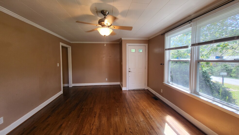 living room and font door - 116 Faw Rowland St