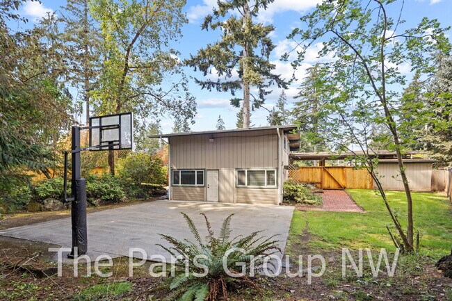 Building Photo - Fantastic Modernized Bridle Trails Mid Century Home * Central A/C, EV Charger, Exceptional Outdoo...