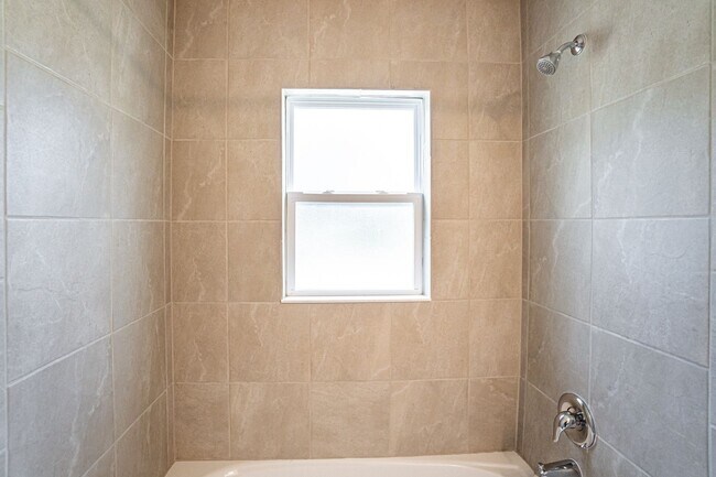 Building Photo - MOVE IN SPECIAL- Beautiful 3/2 Energy Effi...