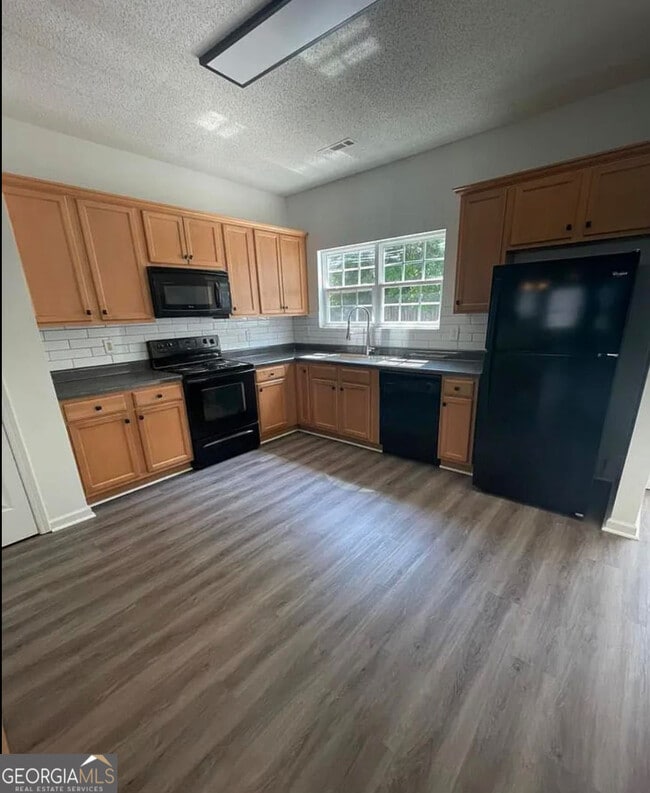 Building Photo - 8490 Oakley Cir