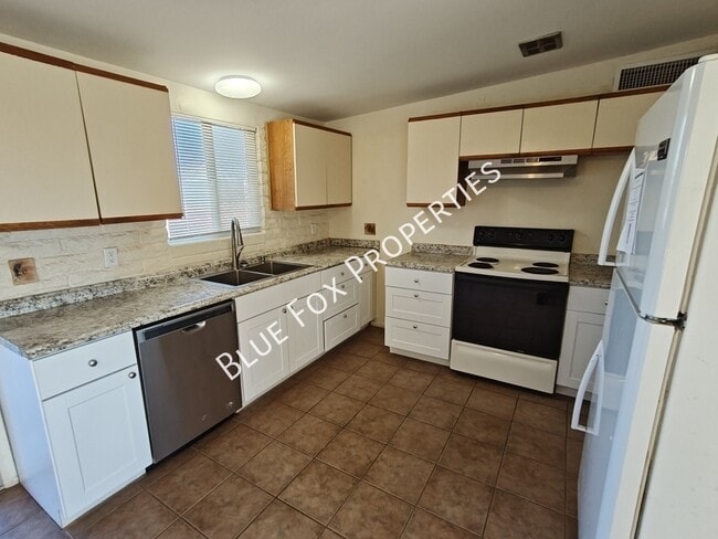 Building Photo - 3755 S Amos Pl