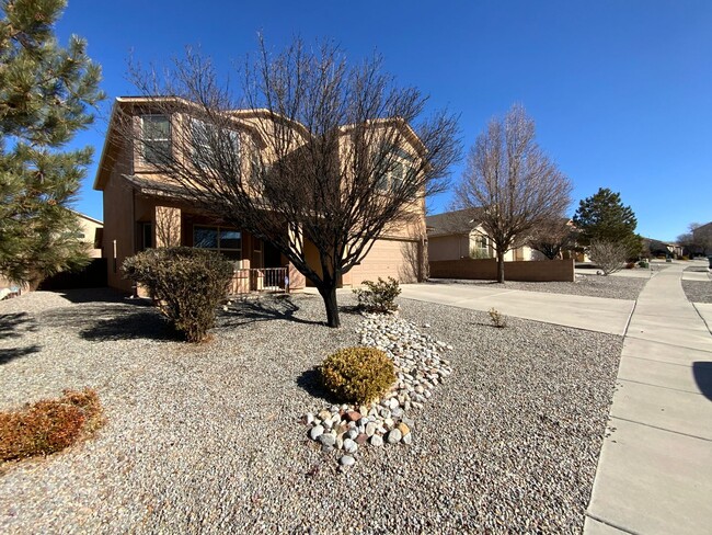 Building Photo - 4 Bedroom Home Available Near Unser Blvd N...