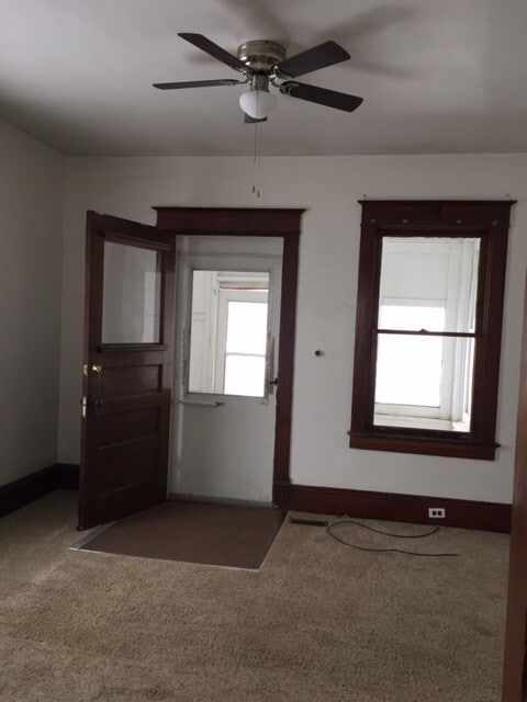 Building Photo - Corner lot with fenced yard!