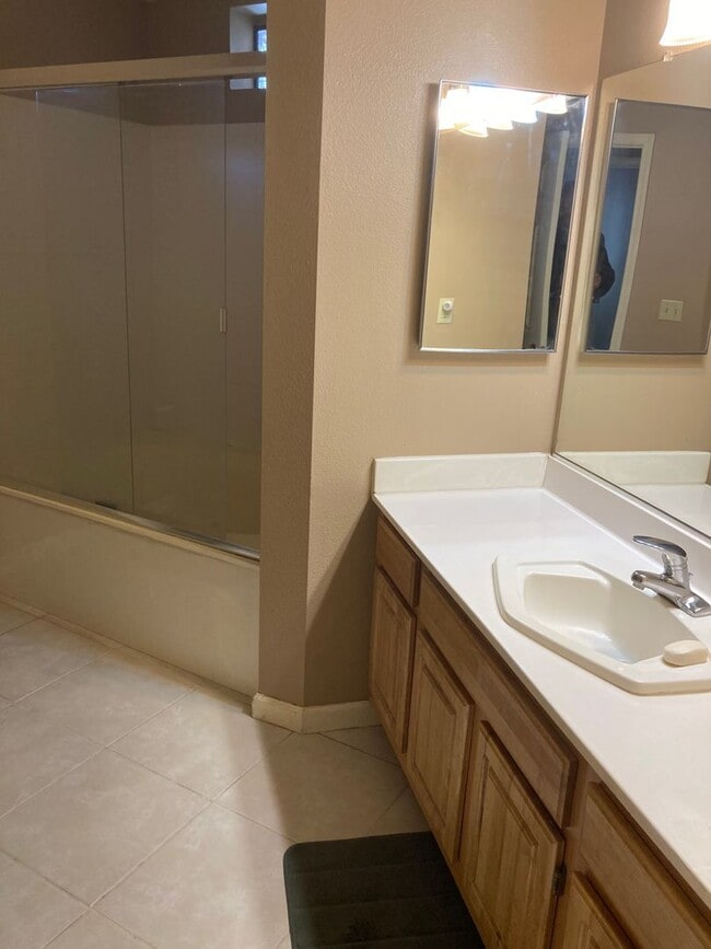 Building Photo - Tanamera Resort Gated Community.  One bedroom, one full bathroom, one car attached garage.