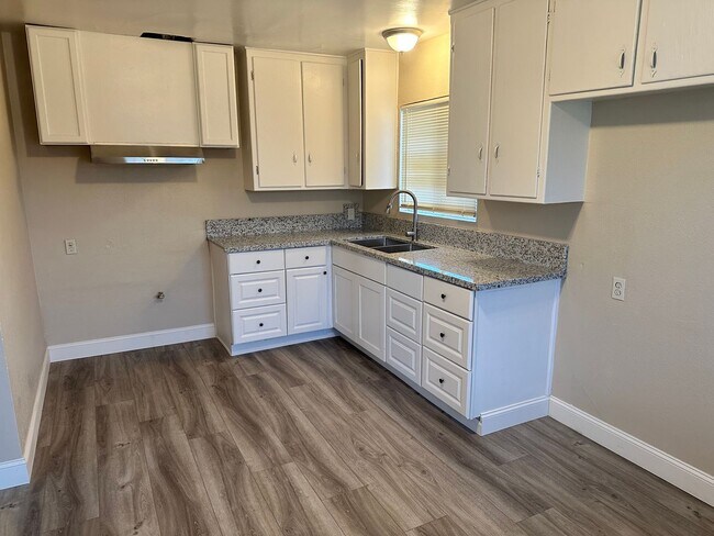 Building Photo - This cute home won't last long with a new ...