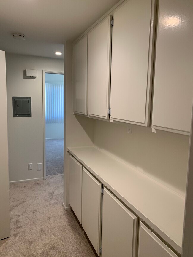 Linen Closet storage and folding platform - 8180 Manitoba St