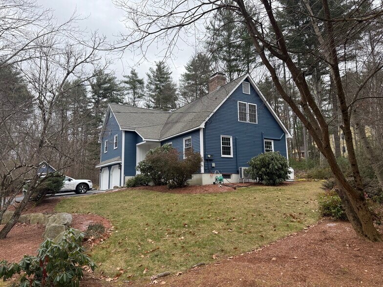 Home side view - 34 Hitching Post Ln