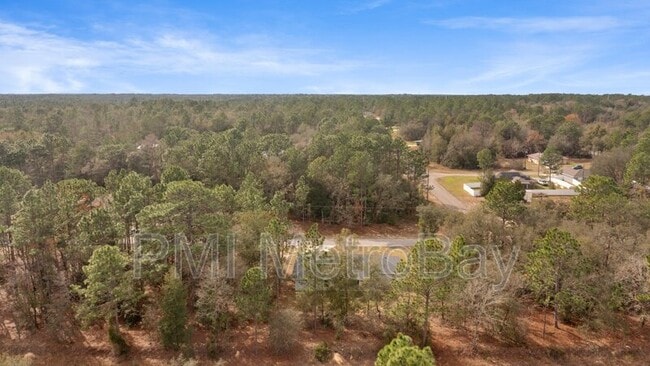 Building Photo - 9461 N Sandree Dr